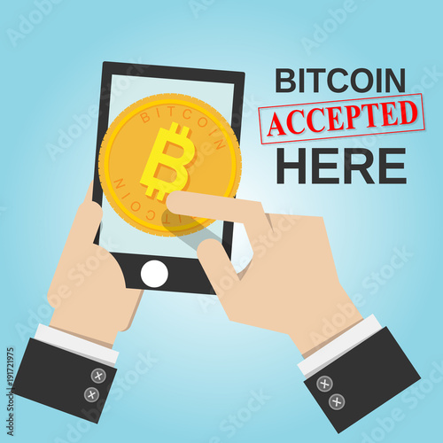 smartphone in business man hand with bitcoin sign and word bitcoin accepted here. bitcoin electronic money concept
