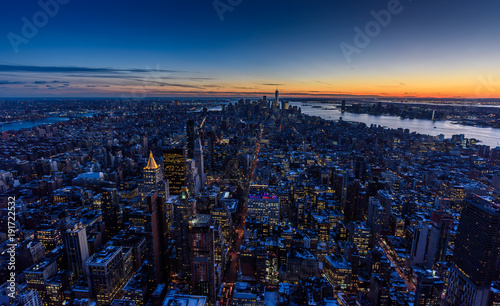 New York City - Manhattan downtown skyline skyscrapers at night - View from Observation Deck on the Empire State Building at twilight. USA.