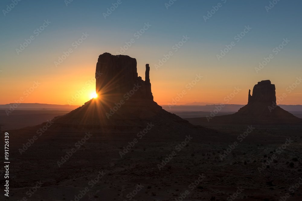 Beautiful sunrise over iconic Monument Valley, Arizona.