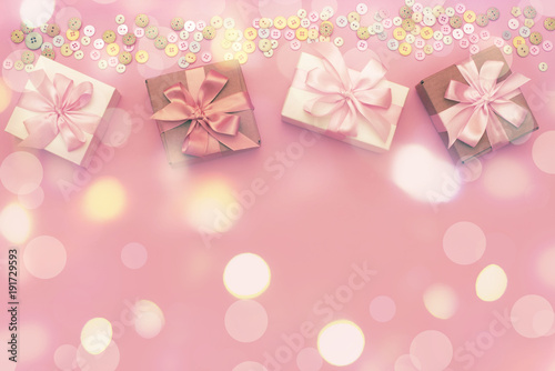 Boxes with gifts on a festive background. © Evgeniia
