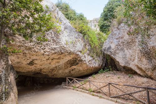 Syracuse, Sicily, Italy. A pedestrian walkway under the rock in the 