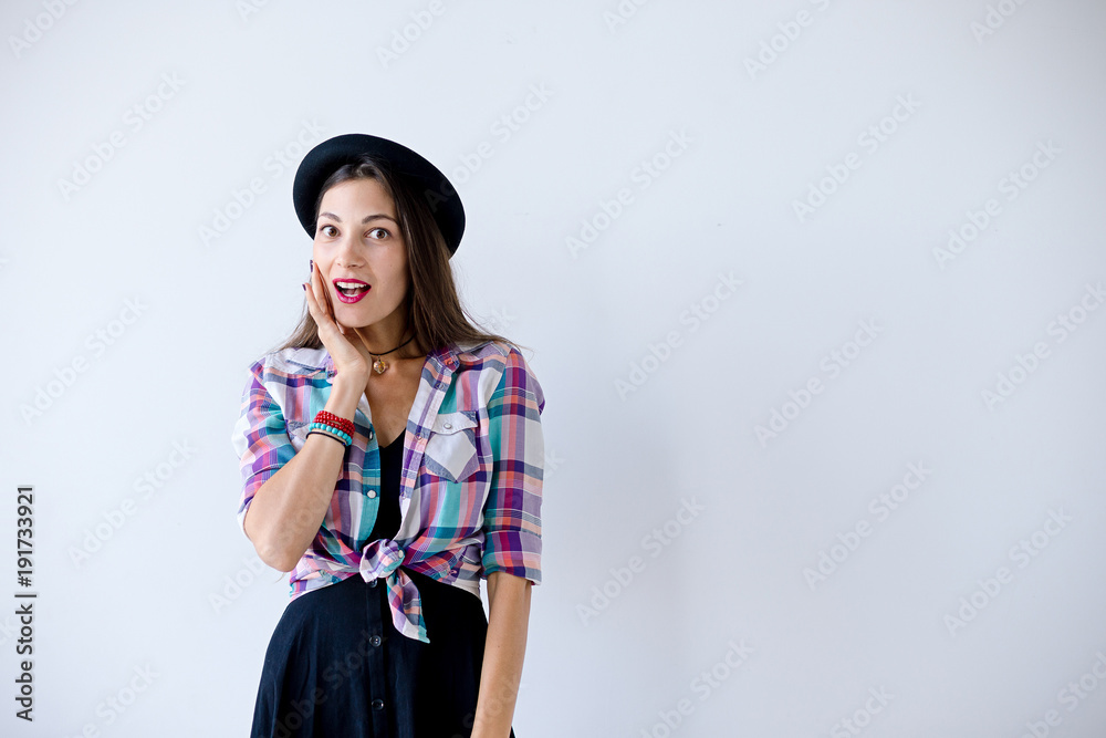 Surprised woman touching her face studio Surprised woman touching her face studio