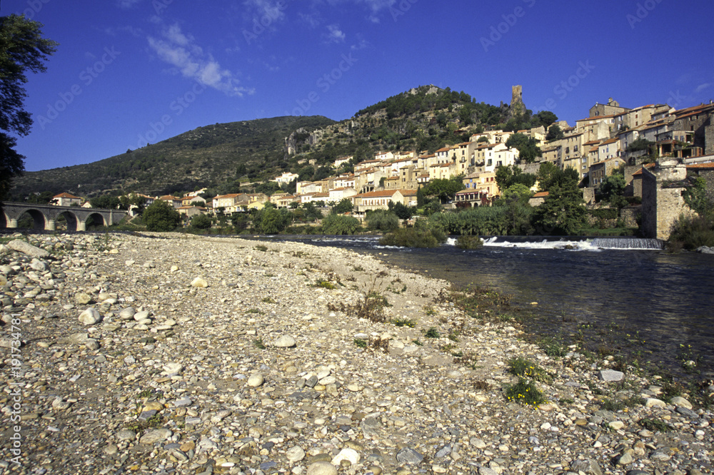 Autumn sunshine on the idyllic hillside village of Roquebrun on the River Orb, Herault, Languedoc-Roussillon, France