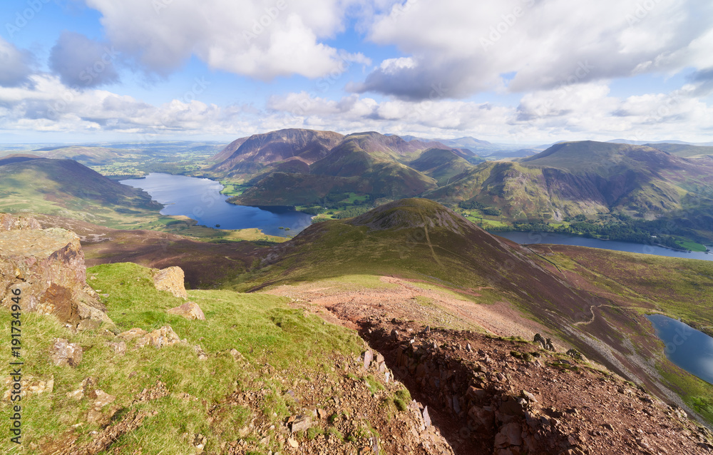 Views of Lake Buttermere and Crummock Water on route to the summit of Red Pike with Wandope, Whiteless Pike, Grasmoor and Robinson in the distance. The English Lake District, UK.