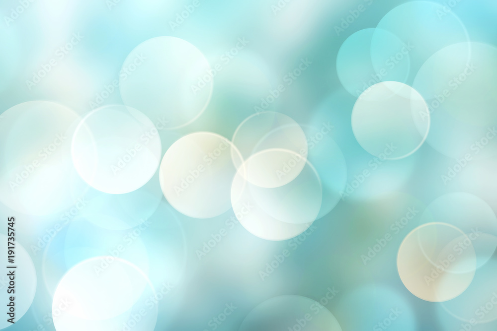 Light blue blurred background.