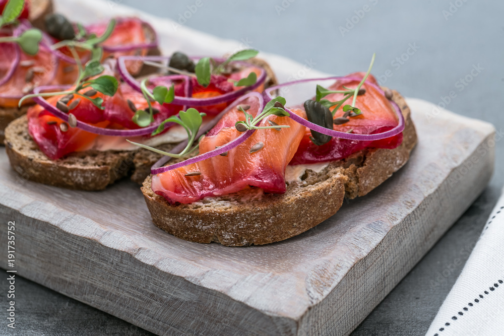 Fish Tapas on Crusty Bread, bread and cured salmon Fish Tapas on Crusty Bread, bread and cured salmon