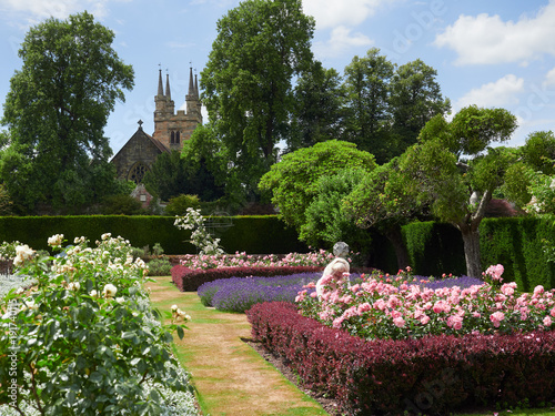 TONBRIDGE, ENGLAND, UK - JULY 01, 2017: Flower gardens at the historic medieval grounds and buildings of Penhurst Place. photo