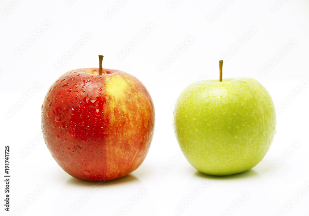 A picture of two apples standing next to each other A picture of two apples standing next to each other