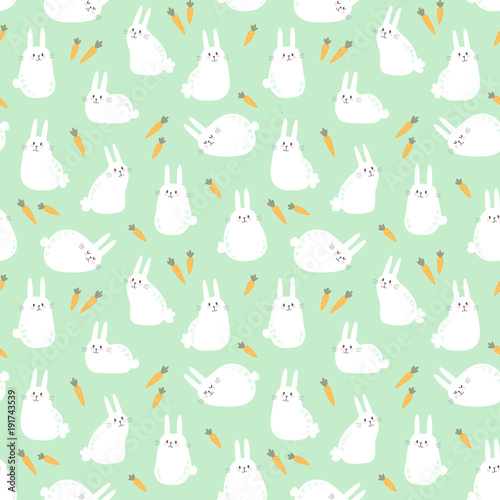 Fototapeta Naklejka Na Ścianę i Meble -  Vector seamless pattern with cute bunnies and carrots. Cute background for kids