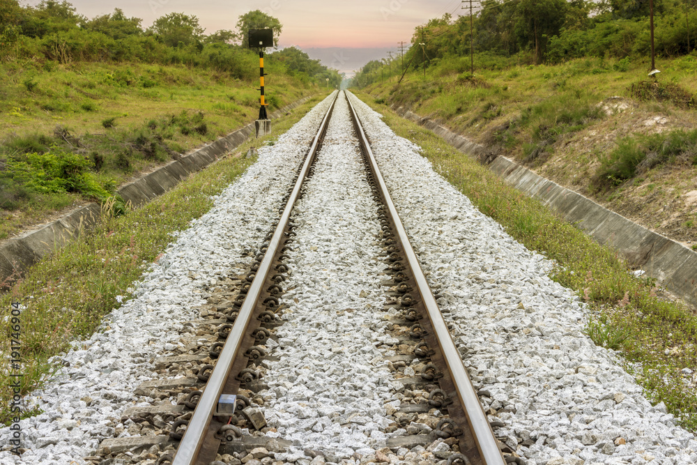 railroad tracks made of steel rails along which passenger and freight trains run. railroad tracks made of steel rails along which passenger and freight trains run.