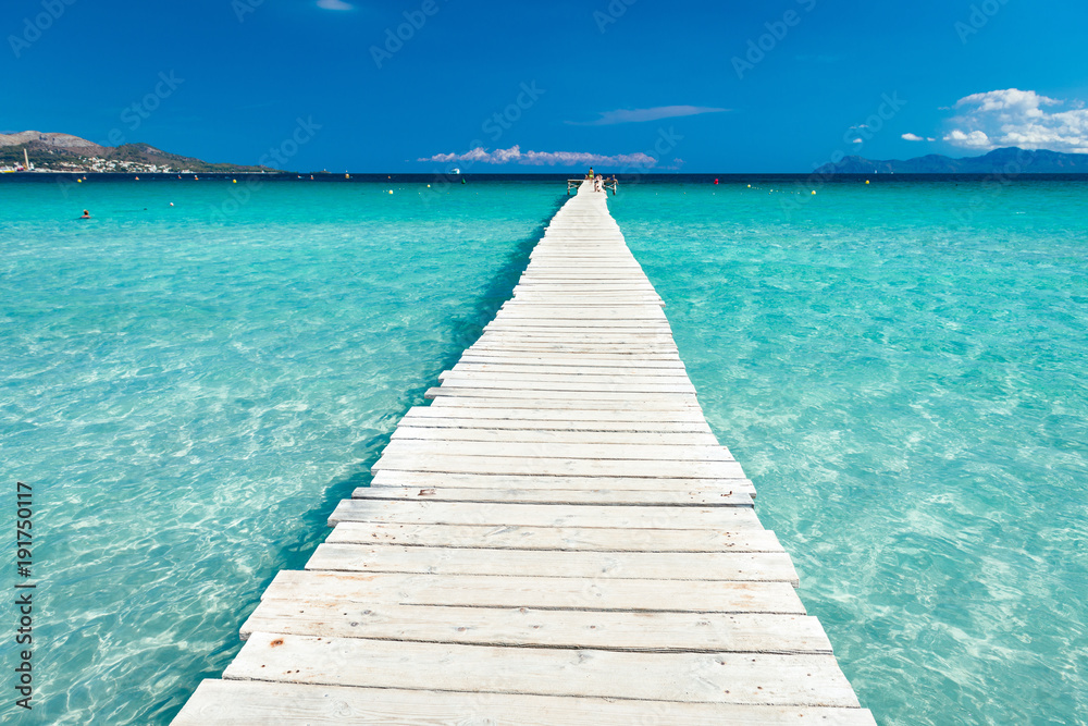 Wooden pier in the turquoise blue sea - 4164