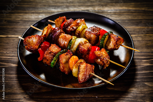 Shish kebabs - grilled meat and vegetables photo