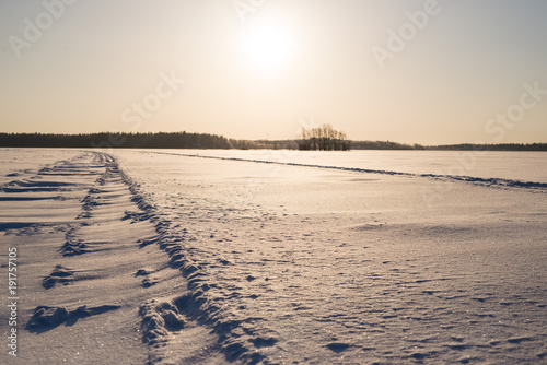 Sunny Day on Snowy Lake Ice, focus on foreground © iluphoto