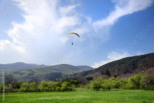 Paragliding on a sunny day during springtime