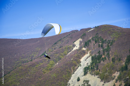 Paragliding on a sunny day during springtime