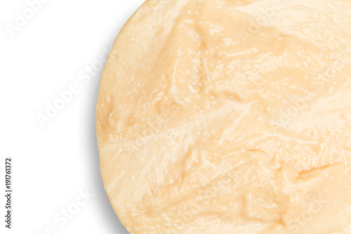 Whole round Head of parmesan or parmigiano hard cheese on white background