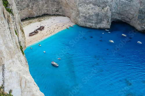 Navagio bay and Ship Wreck beach in summer. The most famous natural landmark of Zakynthos, Greece © MARTINFFFF