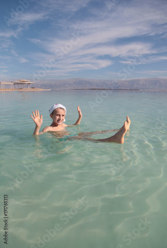 Happy little Santa at the Dead Sea, Israel © Slepitssskaya