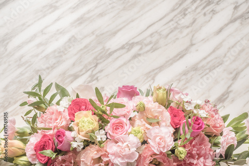 sweet roses bouquet on marble background