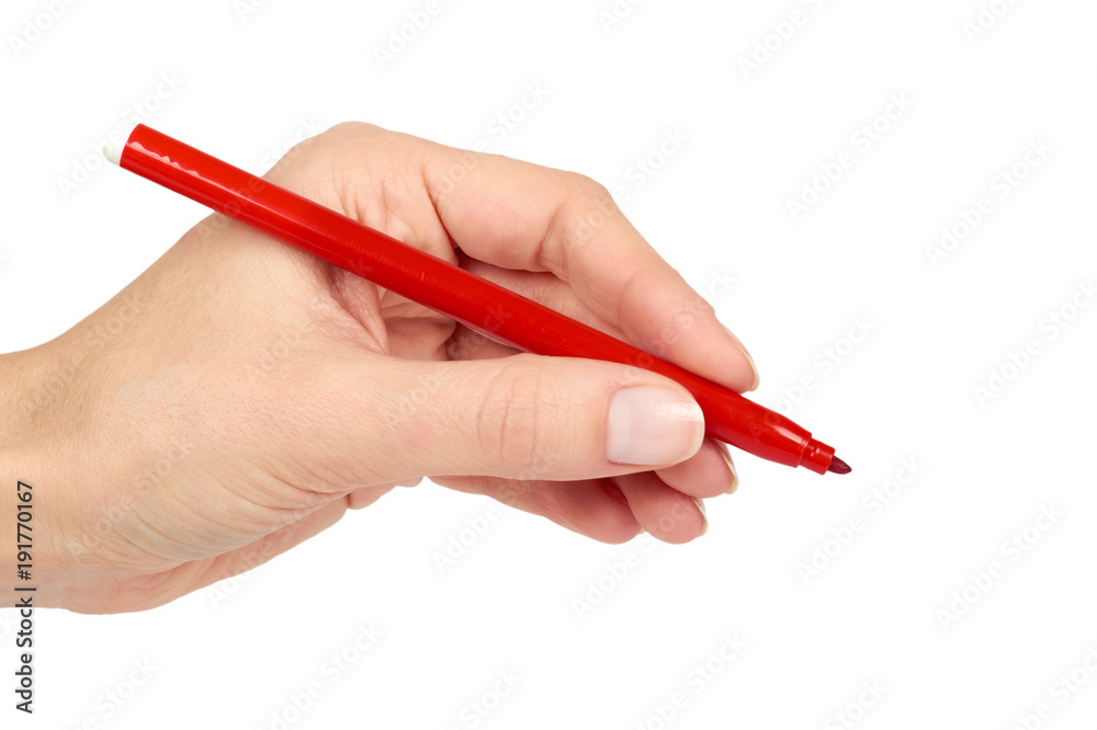 Red felt tip pen in hand, isolated on white background Red felt tip pen in hand, isolated on white background
