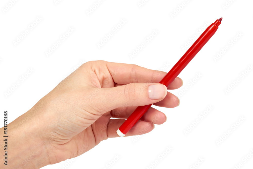 Red felt tip pen in hand, isolated on white background Red felt tip pen in hand, isolated on white background