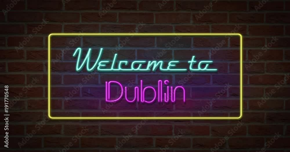 Neon text sign of Welcome to Dublin in brick background Neon text sign of Welcome to Dublin in brick background