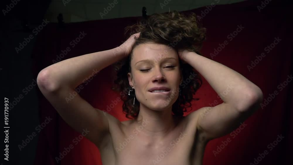 Curly brunette shows an orgasm and smiles Curly brunette shows an orgasm and smiles
