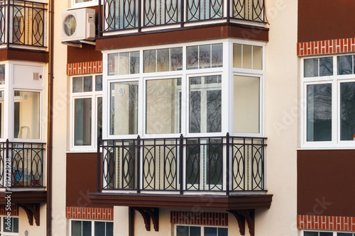 Glazed balcony in a modern apartment building.