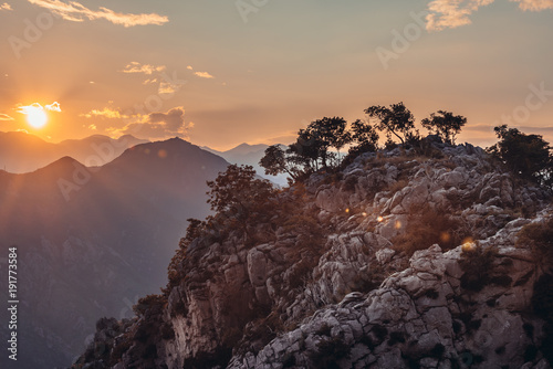 Evening view of rocks on the top of mountain above Kotor town in Montenegro