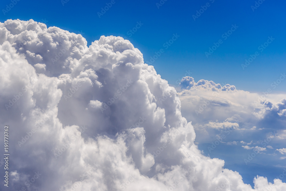 Cumulus cloudscape seen from a window plane Cumulus cloudscape seen from a window plane