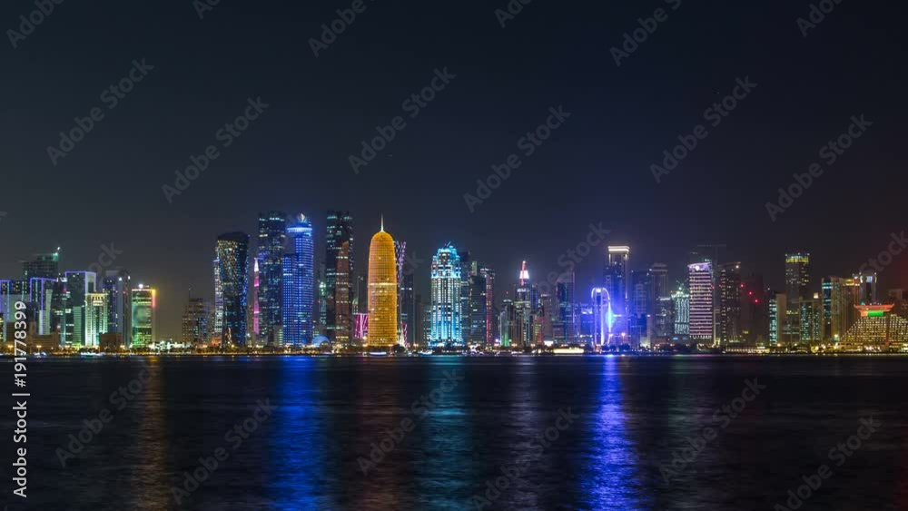 Doha skyscrapers in downtown skyline night timelapse, Qatar, Middle East Doha skyscrapers in downtown skyline night timelapse, Qatar, Middle East