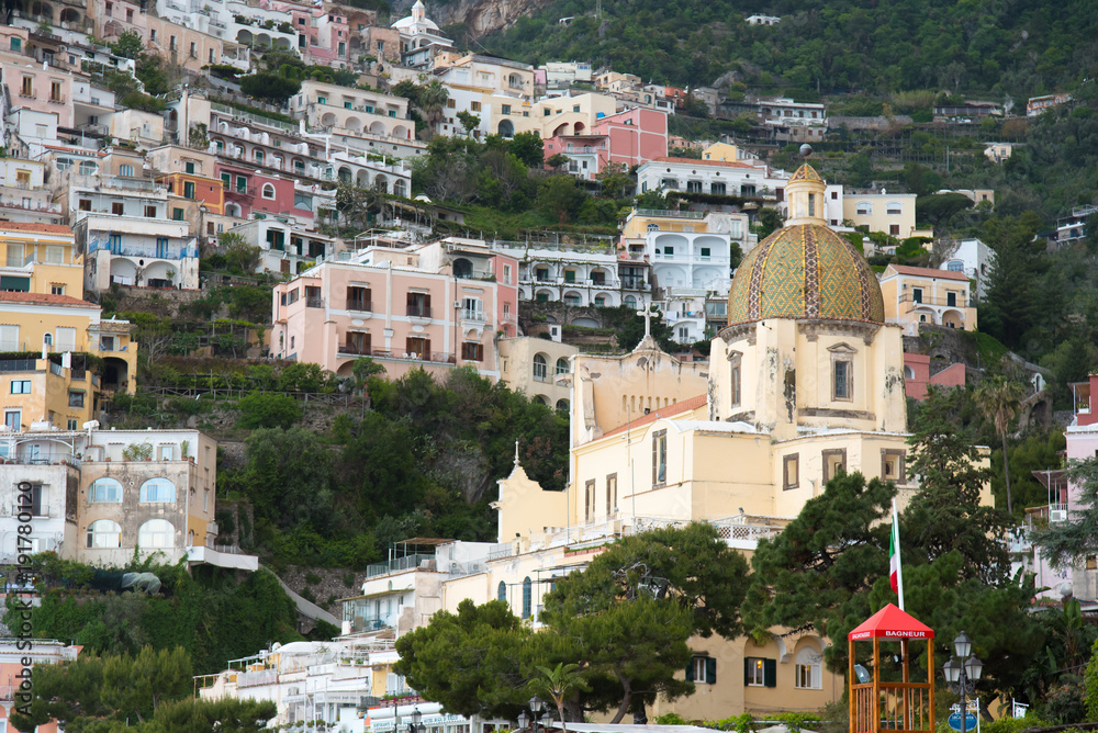 Cliffside town on the Mediterranean, on Amalfi Coast in Positano with colourful houses with church