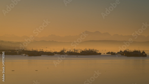 Sunrise in the harbour of Quellon in Chiloe Island. Patagonia in Chile © Erlantz