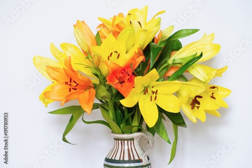 Fototapeta Naklejka Na Ścianę i Meble -  Orange and yellow lily bouquet.