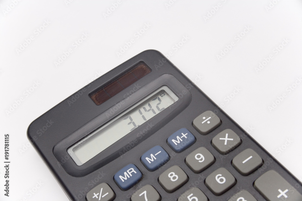 Calculator on white background showing value of pi Calculator on white background showing value of pi
