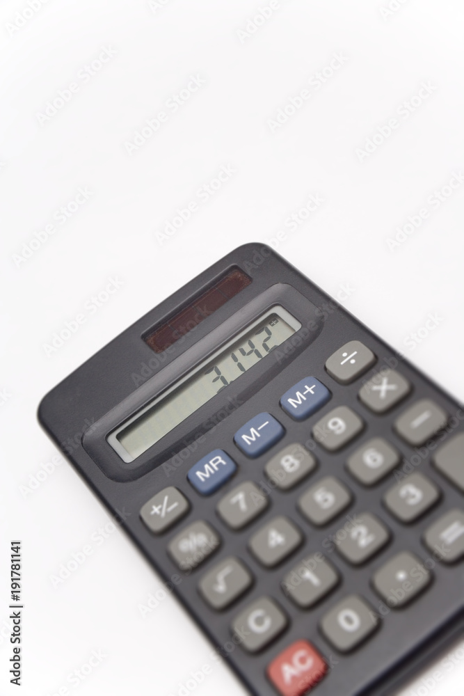 Calculator on white background showing value of pi, unsharp keyboard Calculator on white background showing value of pi, unsharp keyboard