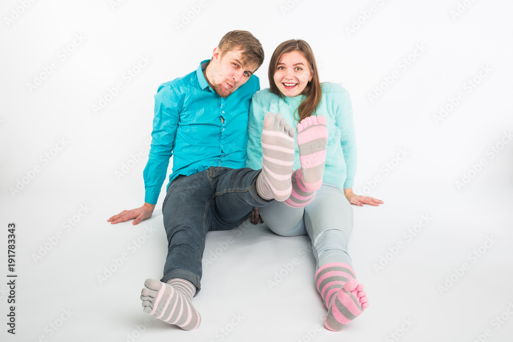 Happy couple having fun and fooling around. Joyful man and woman have nice time. Good relationship and valentines day concept Happy couple having fun and fooling around. Joyful man and woman have nice time. Good relationship and valentines day concept