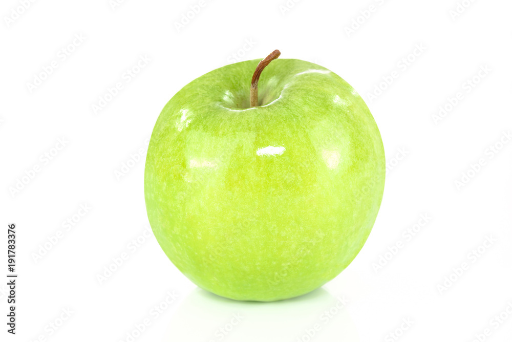 Green apple isolated on white background in close-up