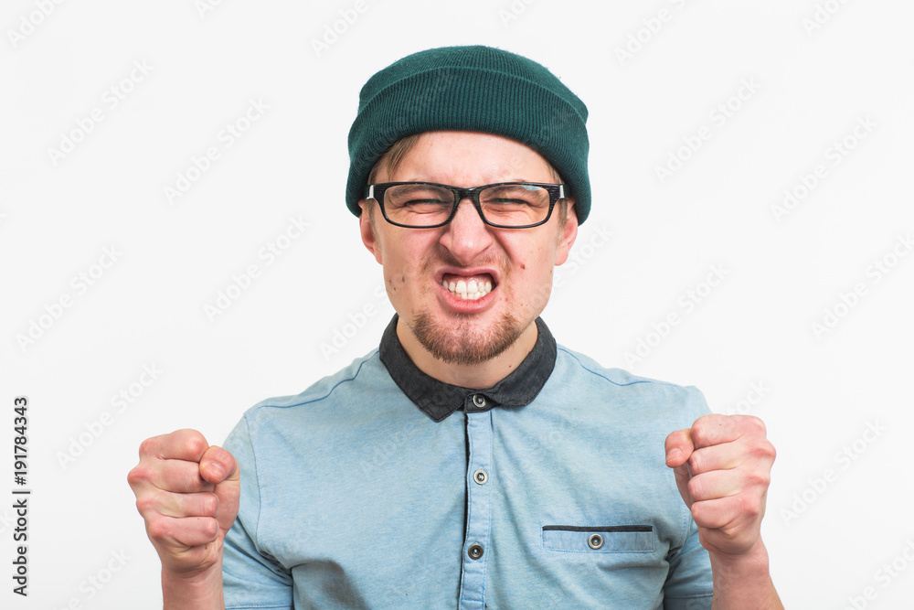 Angry aggressive man with ferocious expression Angry aggressive man with ferocious expression