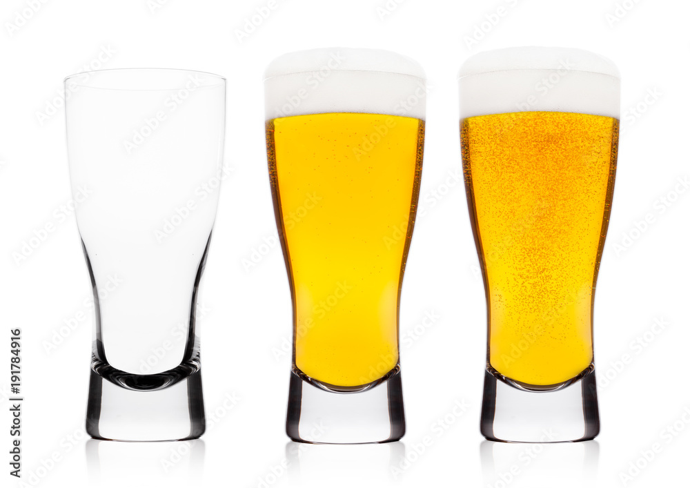 Cold glasses of lager ale beer with foam Cold glasses of lager ale beer with foam