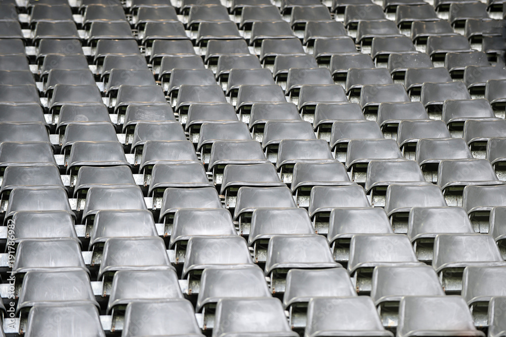 graue Sitzreihen im Stadion graue Sitzreihen im Stadion