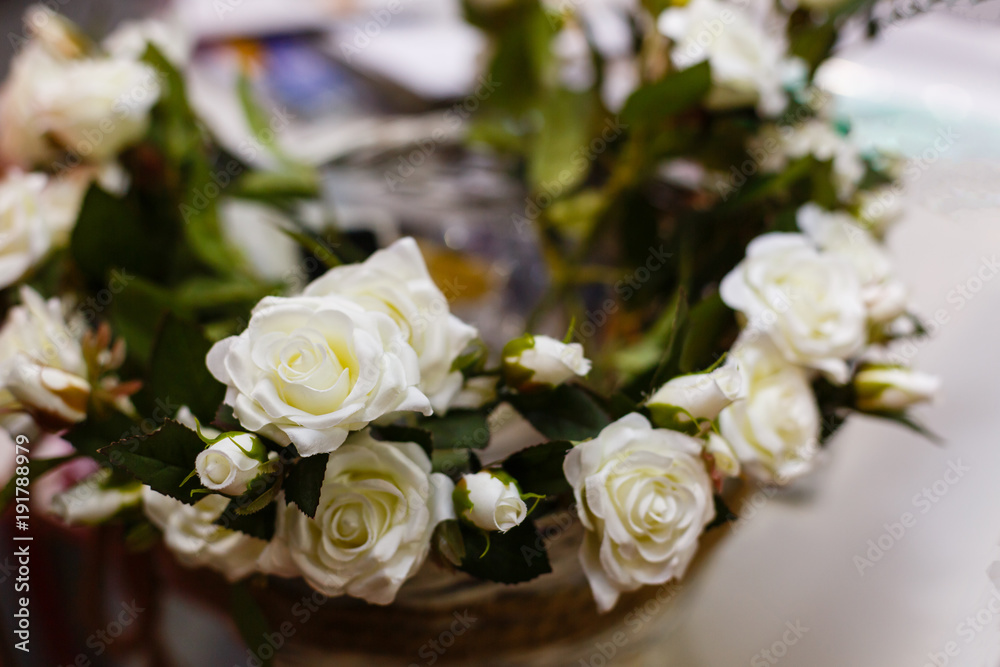 close up basket of white roses close up basket of white roses