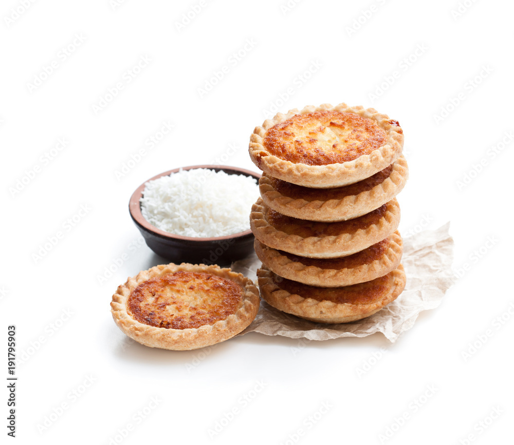 Stack of coconut tarts isolated on white Stack of coconut tarts isolated on white
