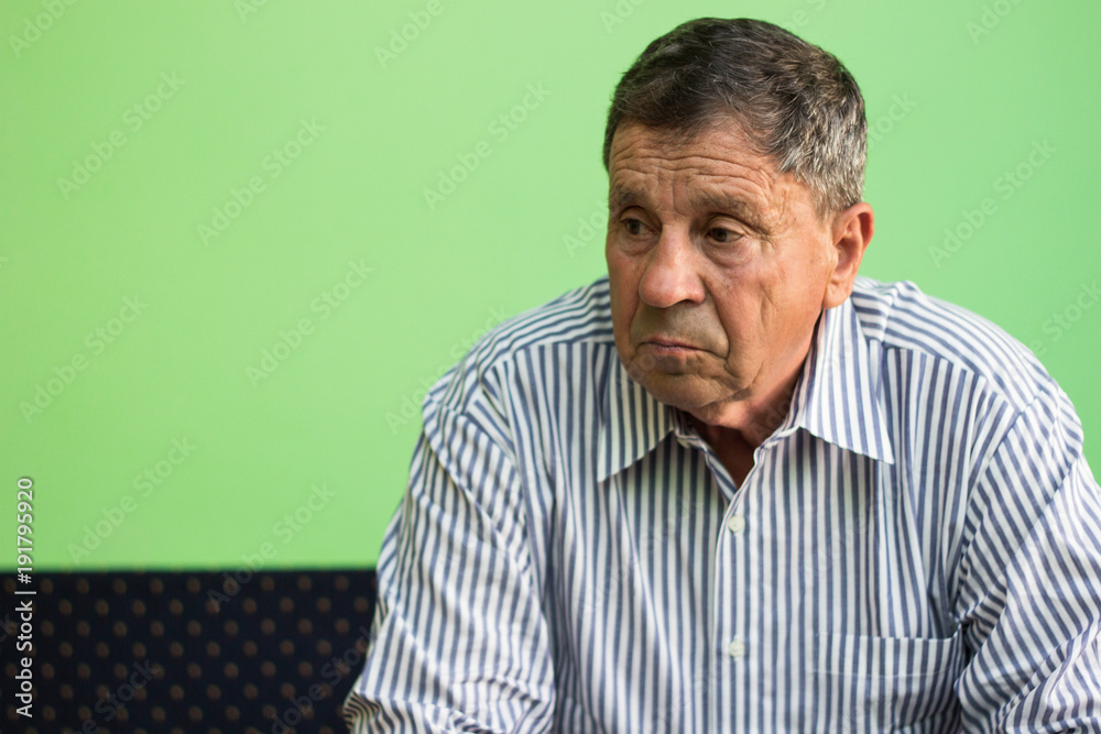 Obraz premium Elderly man lost in thought 
