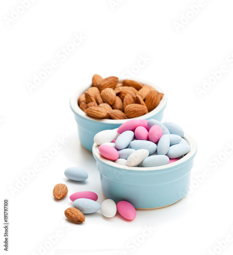 Sugared almonds on white background. Christmas dessert.