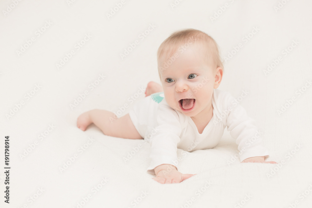 Close-up Portrait of Very Cute Adorable 8 Month Old Baby Girl Daughter with Big Blue Eyes, Happy Baby Concept, Healthy Child Close-up Portrait of Very Cute Adorable 8 Month Old Baby Girl Daughter with Big Blue Eyes, Happy Baby Concept, Healthy Child