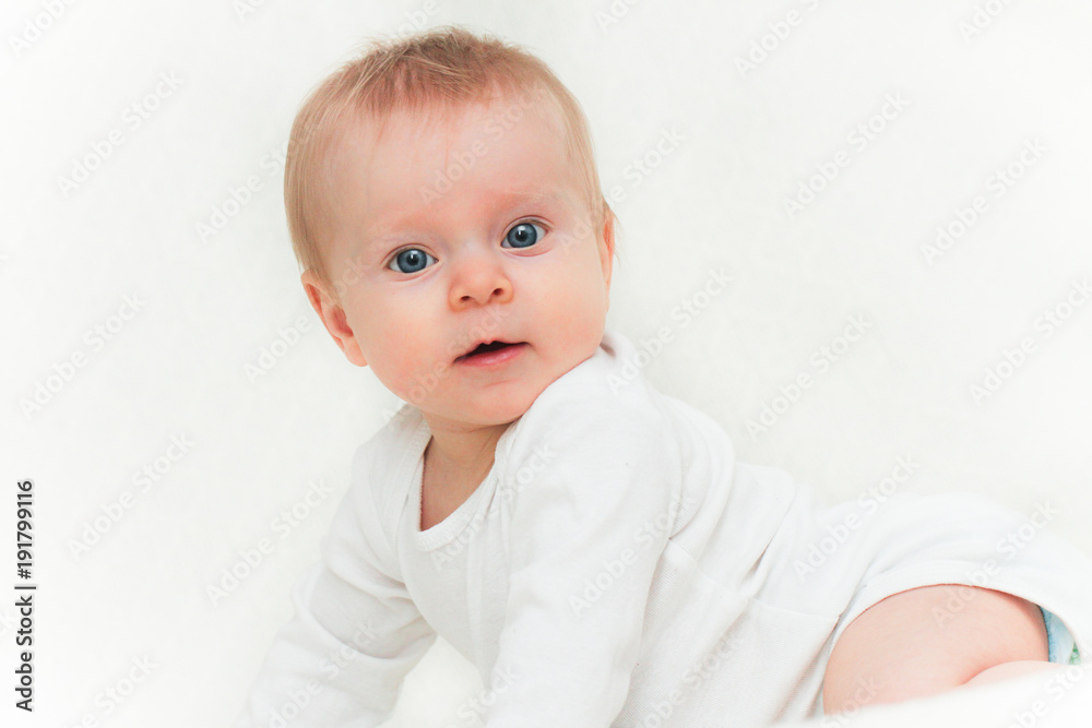 Close-up Portrait of Very Cute Adorable 6 Month Old  Baby Girl Daughter with Big Blue Eyes, Happy Baby Concept, Healthy Child