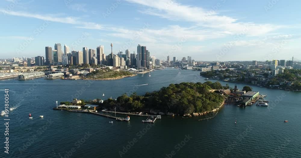 Goat island in the middle of Sydney Harbour aerial flying towards Barangaroo, the Rocks and city CBD.
Goat island in the middle of Sydney Harbour aerial flying towards Barangaroo, the Rocks and city CBD.
