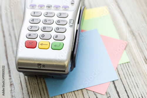 фотографія Modern technology and people concept - pos terminal