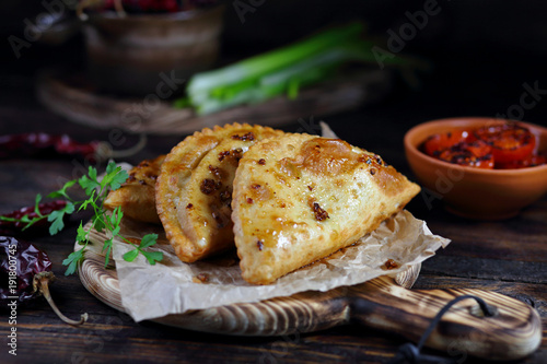 жареные пироги с мясом и со специями  photo